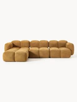 Sofá modular de borreguillo bouclé con reposapiés izquierdo/derecho Tayla (4 plazas)
