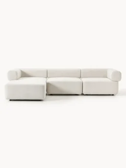 Sofá modular en tejido bouclé Anton (4 plazas), con reposapiés (izquierda/derecha)