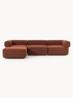Sofá modular en tejido bouclé Anton (4 plazas), con reposapiés (izquierda/derecha)