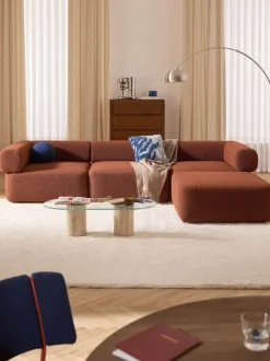 Sofá modular en tejido bouclé Anton (4 plazas), con reposapiés (izquierda/derecha)