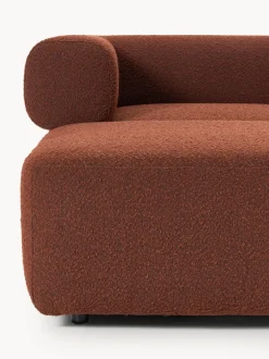 Sofá modular en tejido bouclé Anton (4 plazas), con reposapiés (izquierda/derecha)
