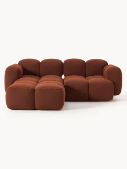 Sofá modular en tejido bouclé con reposapiés Tayla (3 plazas)