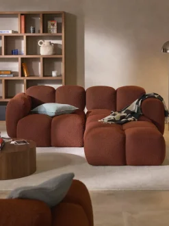 Sofá modular en tejido bouclé con reposapiés Tayla (3 plazas)