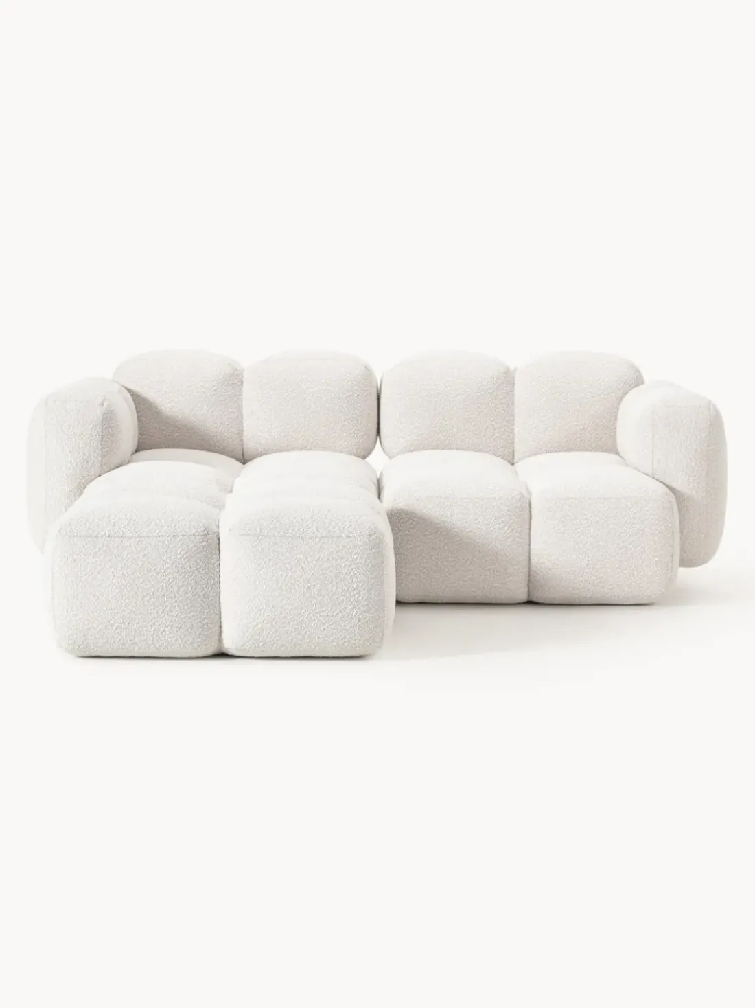 Sofá modular en tejido bouclé con reposapiés Tayla (3 plazas)