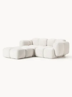 Sofá modular en tejido bouclé con reposapiés Tayla (3 plazas)