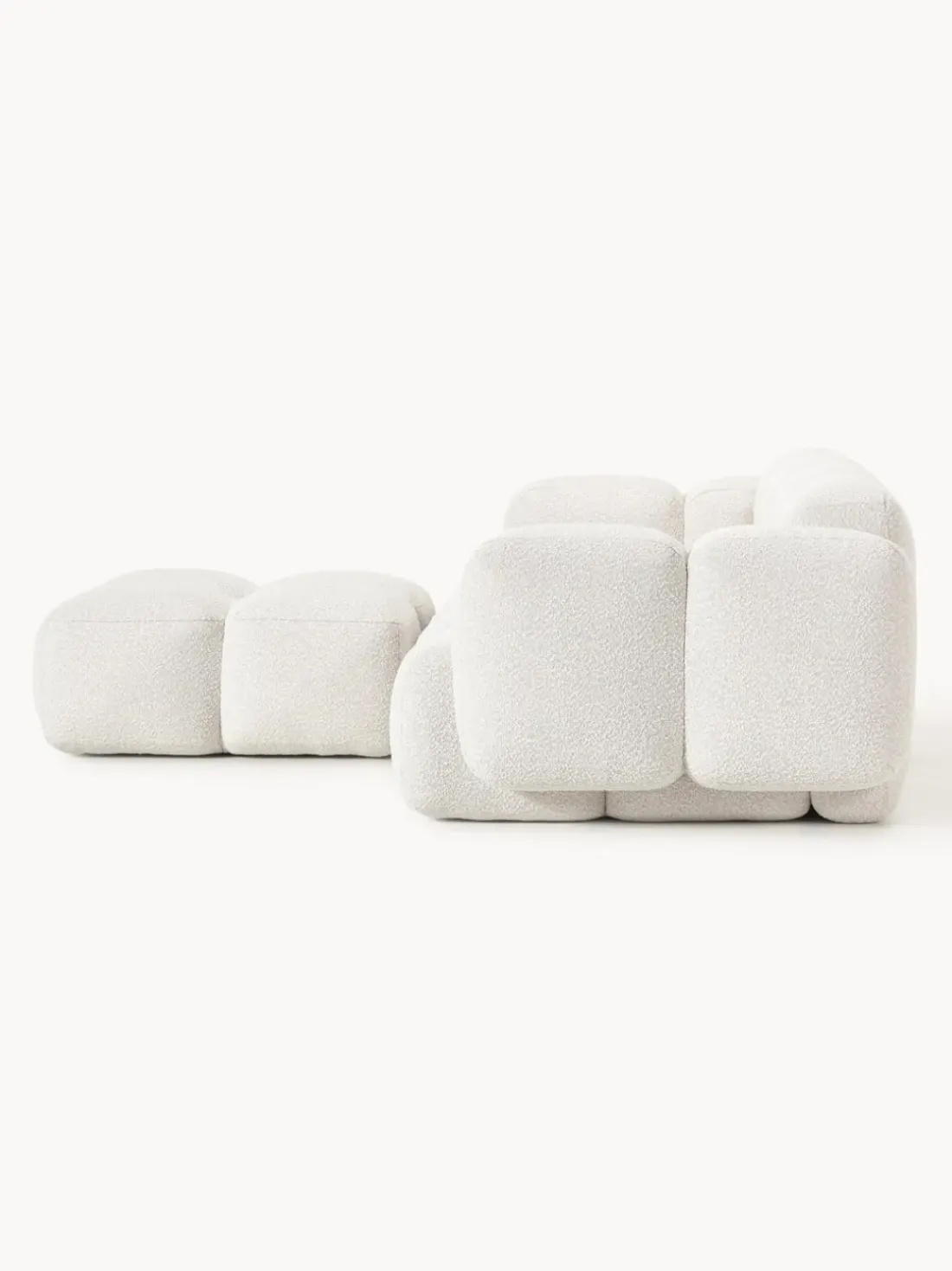 Sofá modular en tejido bouclé con reposapiés Tayla (3 plazas)