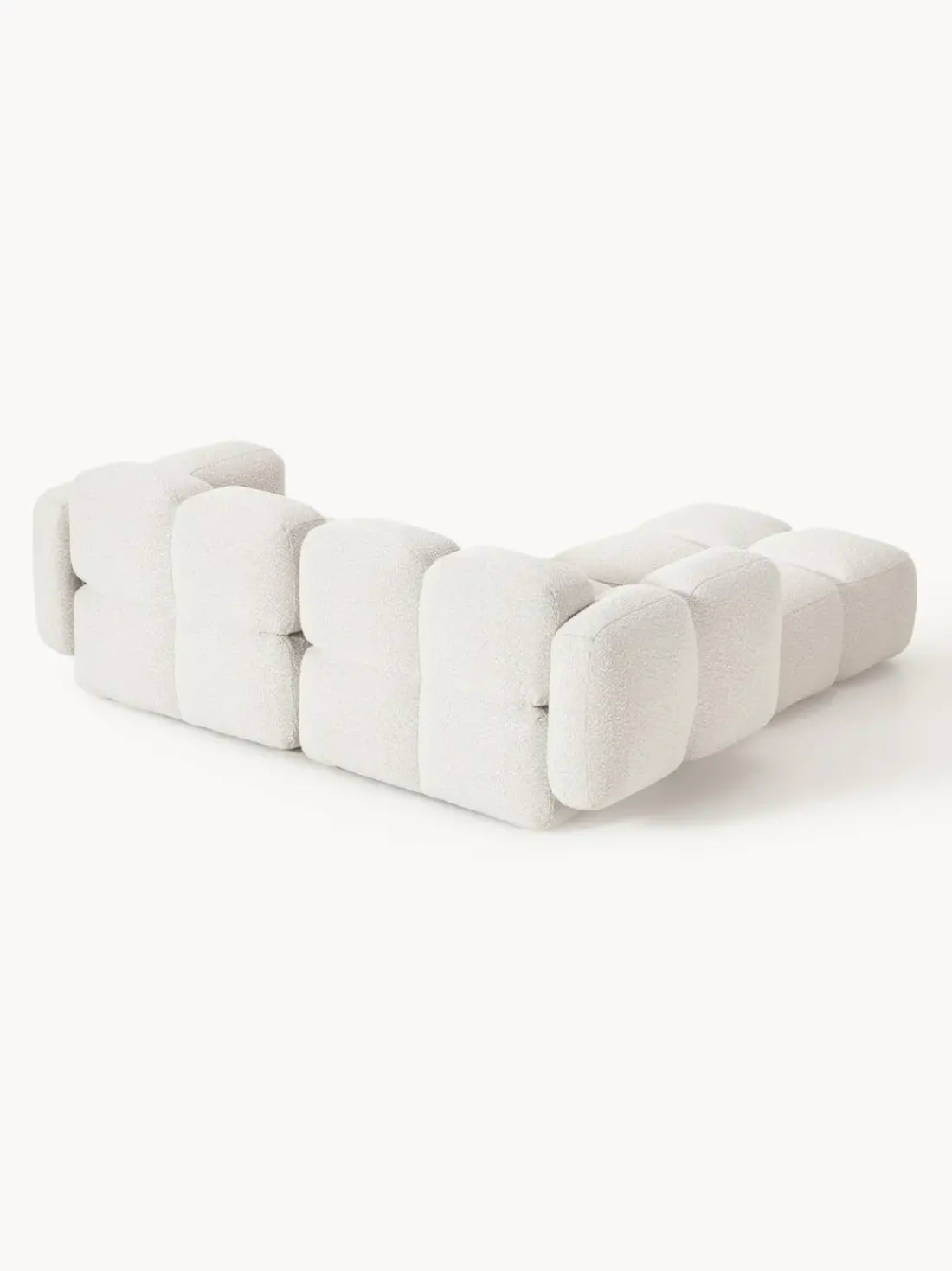 Sofá modular en tejido bouclé con reposapiés Tayla (3 plazas)