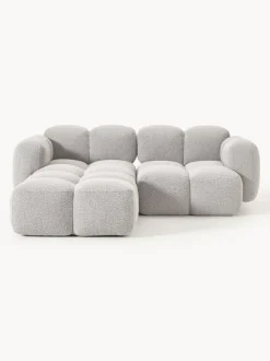 Sofá modular en tejido bouclé con reposapiés Tayla (3 plazas)
