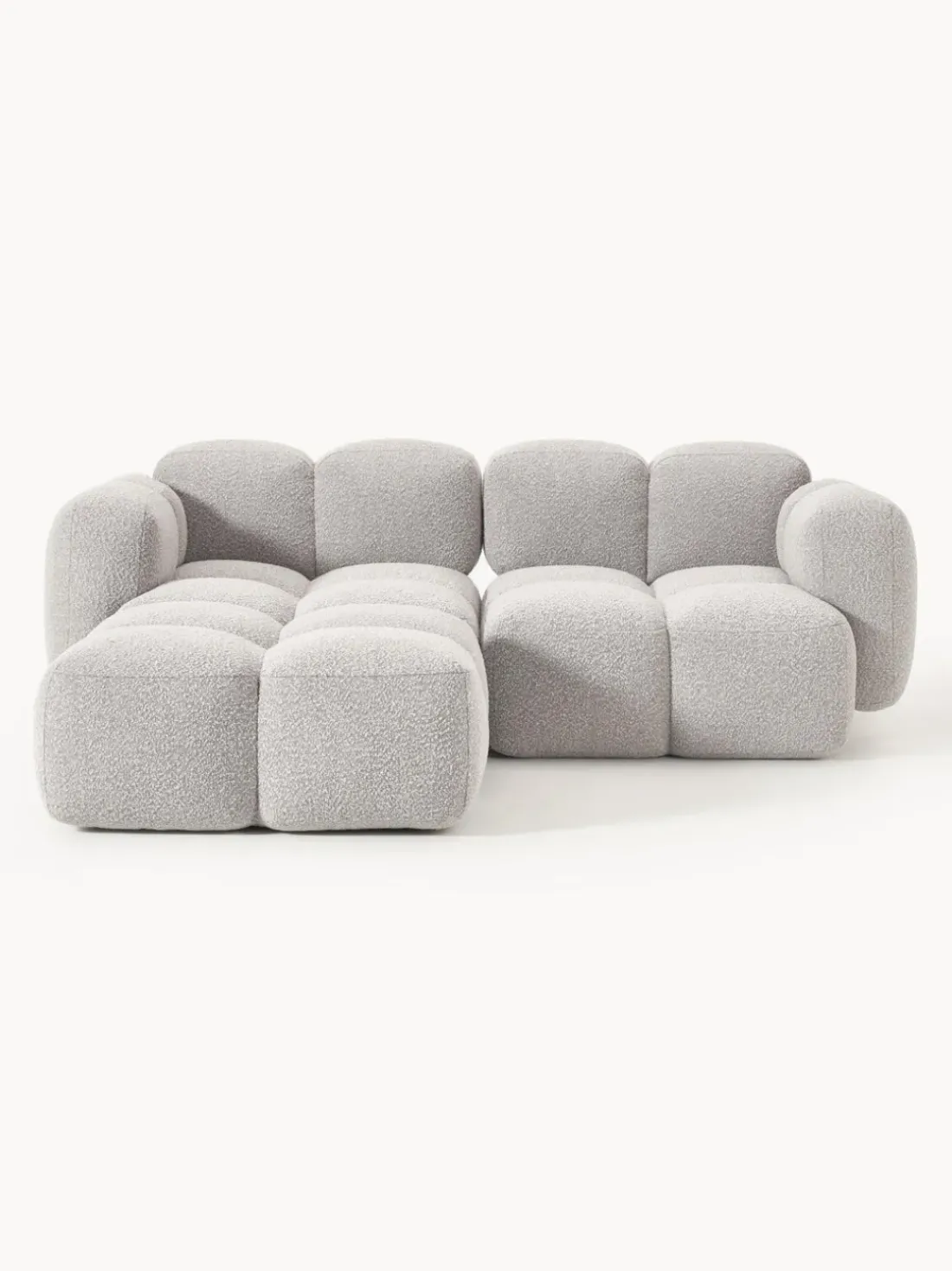 Sofá modular en tejido bouclé con reposapiés Tayla (3 plazas)