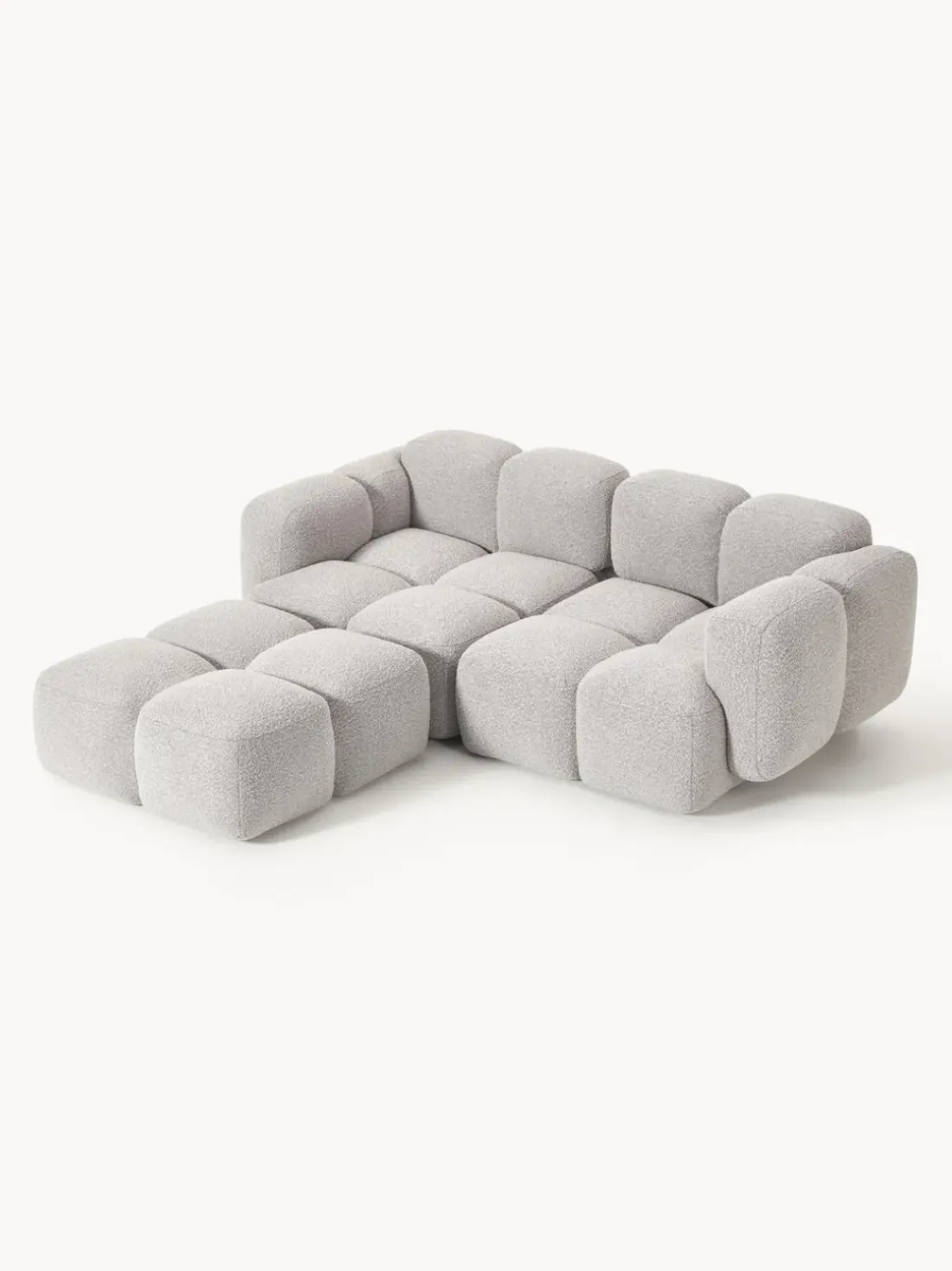Sofá modular en tejido bouclé con reposapiés Tayla (3 plazas)