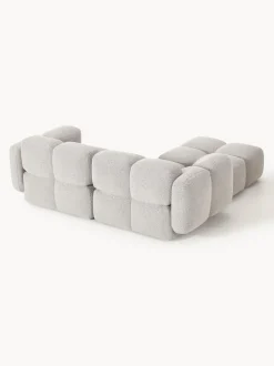 Sofá modular en tejido bouclé con reposapiés Tayla (3 plazas)
