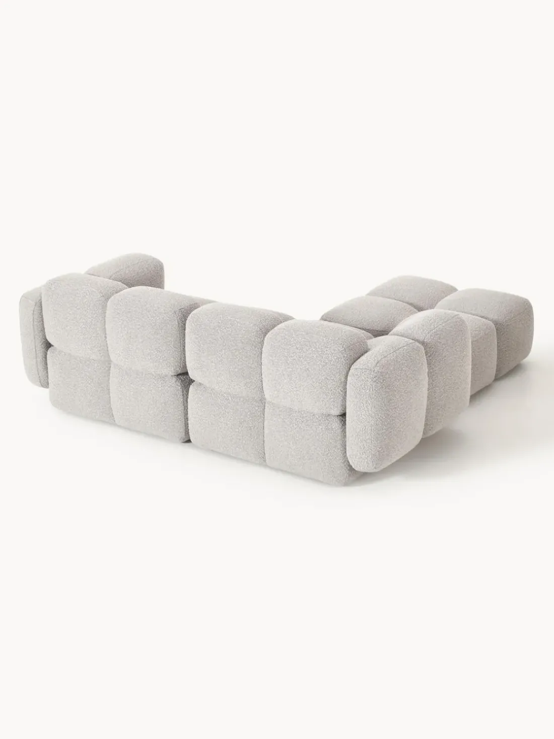 Sofá modular en tejido bouclé con reposapiés Tayla (3 plazas)