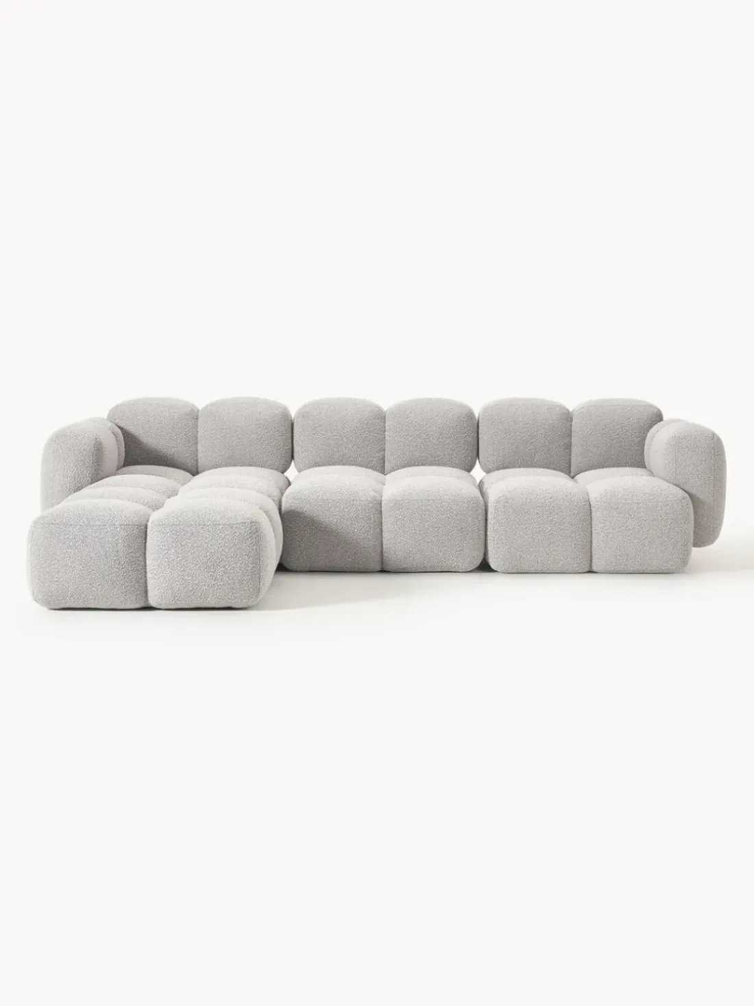 Sofá modular en tejido bouclé con reposapiés Tayla (4 plazas)