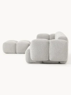 Sofá modular en tejido bouclé con reposapiés Tayla (4 plazas)