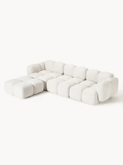 Sofá modular en tejido bouclé con reposapiés Tayla (4 plazas)
