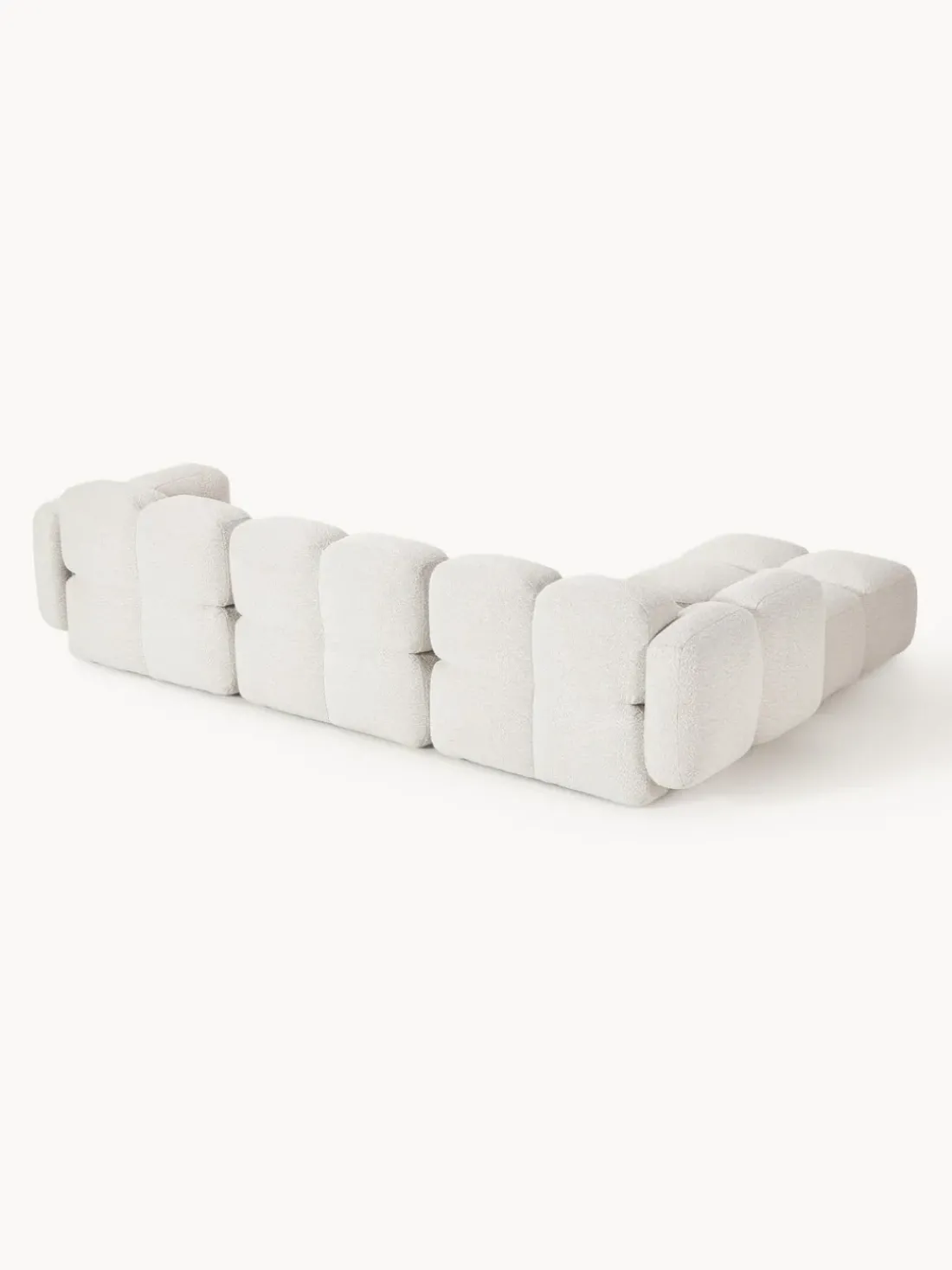 Sofá modular en tejido bouclé con reposapiés Tayla (4 plazas)