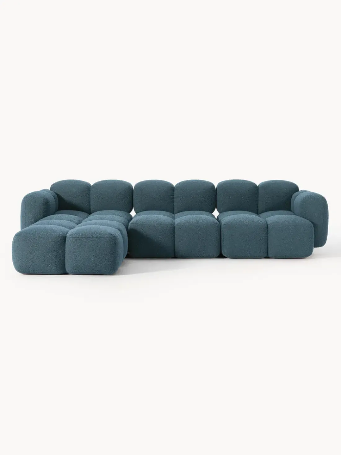 Sofá modular en tejido bouclé con reposapiés Tayla (4 plazas)
