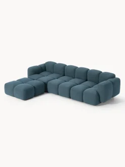 Sofá modular en tejido bouclé con reposapiés Tayla (4 plazas)
