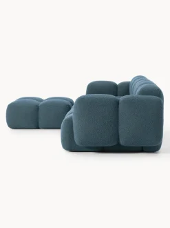 Sofá modular en tejido bouclé con reposapiés Tayla (4 plazas)