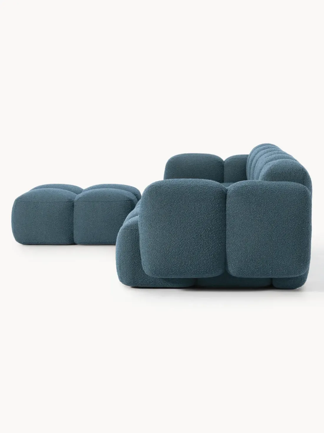 Sofá modular en tejido bouclé con reposapiés Tayla (4 plazas)