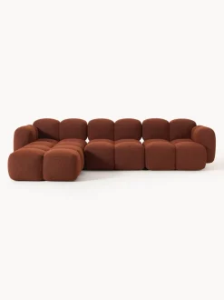 Sofá modular en tejido bouclé con reposapiés Tayla (4 plazas)
