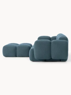 Sofá modular en tejido bouclé con reposapiés Tayla (3 plazas)