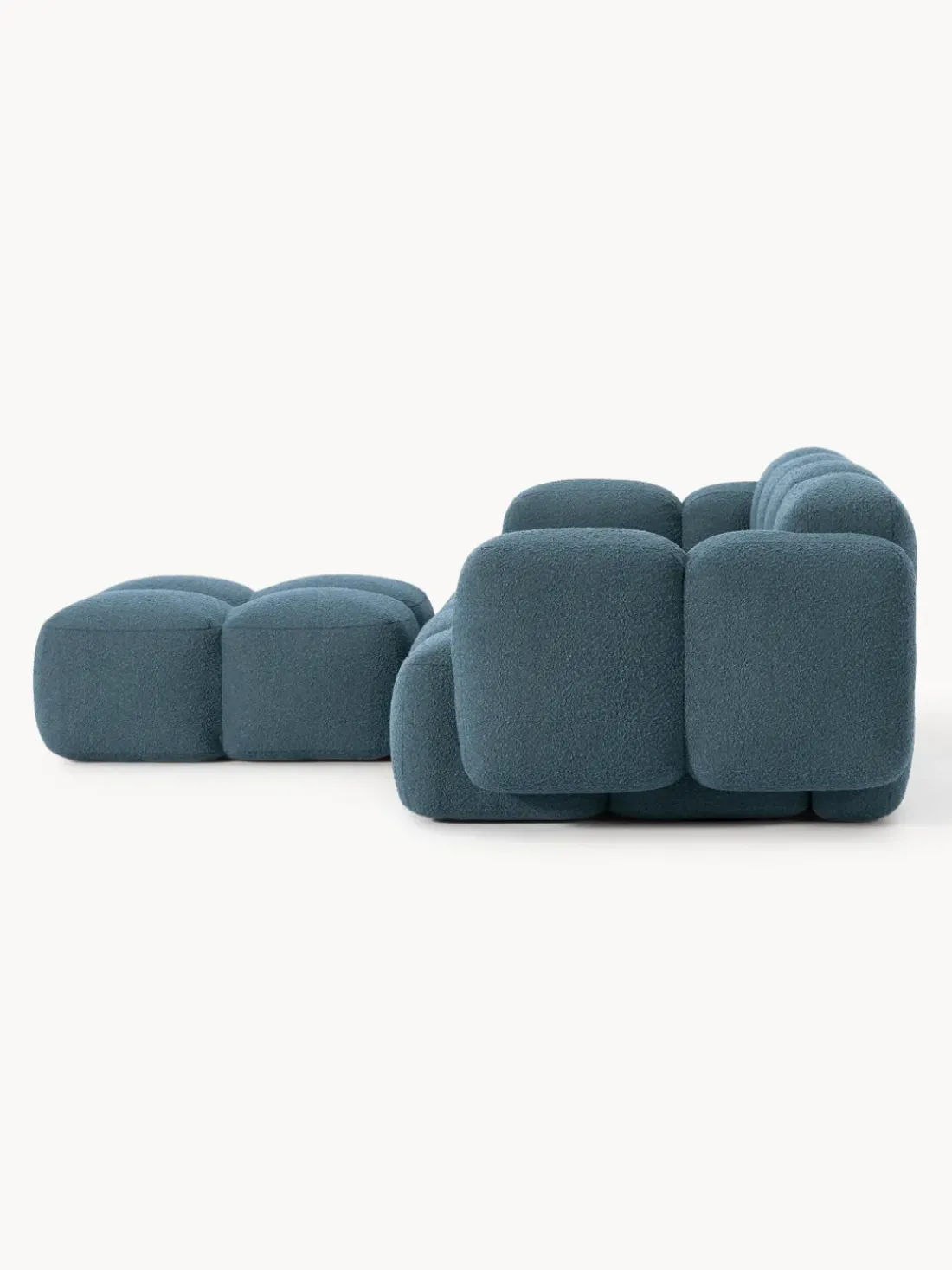 Sofá modular en tejido bouclé con reposapiés Tayla (3 plazas)
