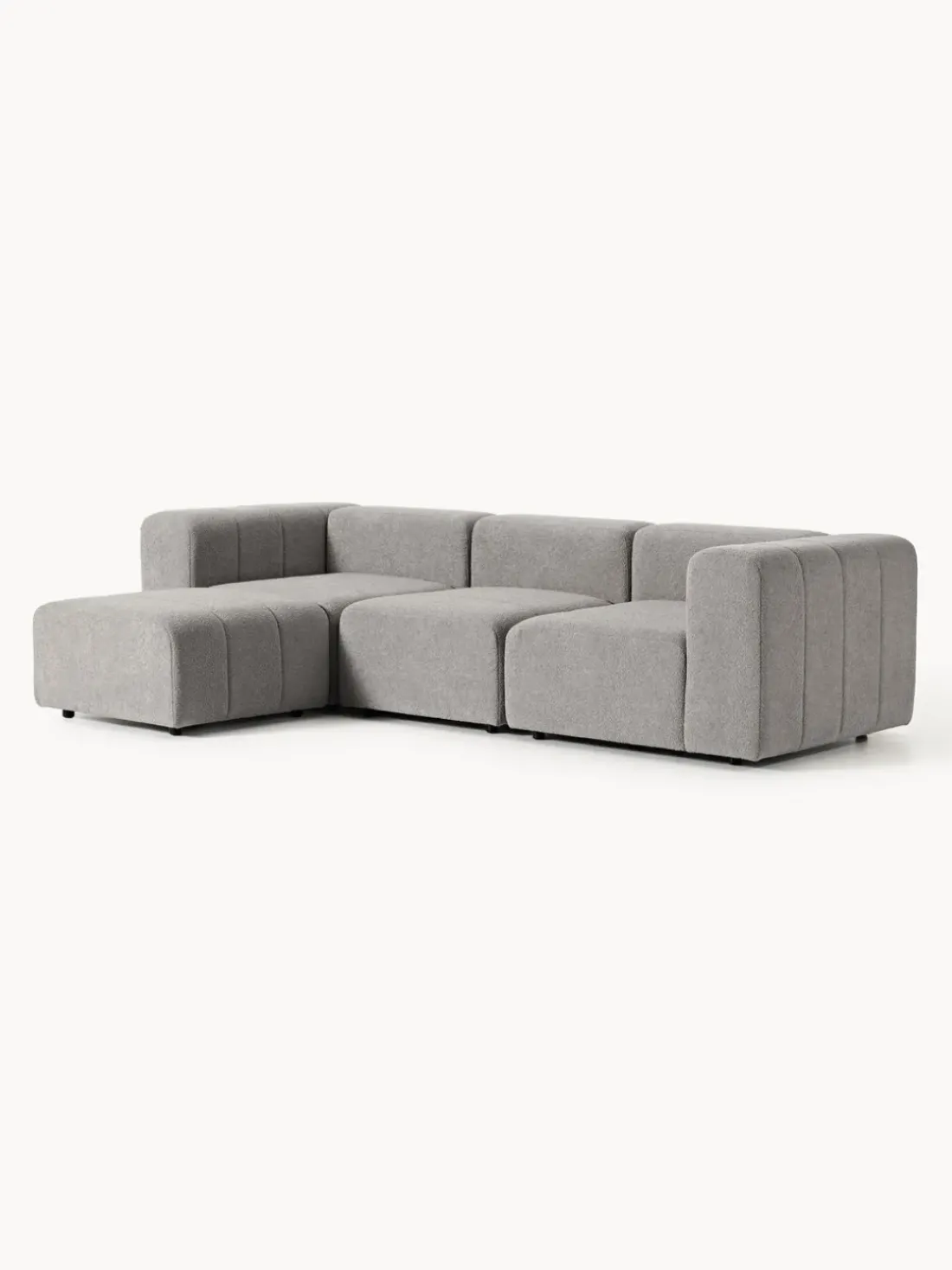Sofá modular en tejido bouclé con reposapiés izquierdo/derecho Lena (4 plazas)