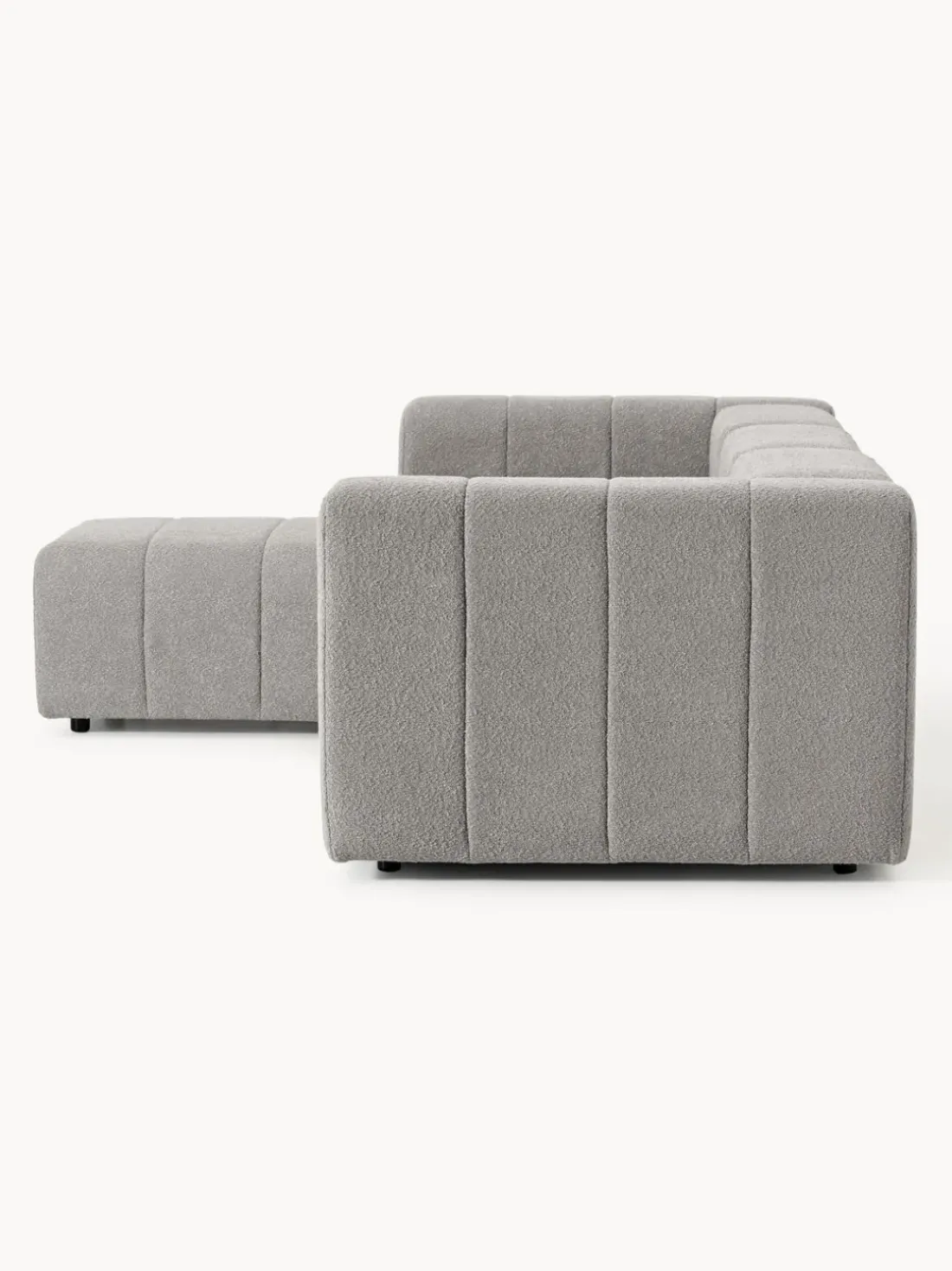 Sofá modular en tejido bouclé con reposapiés izquierdo/derecho Lena (4 plazas)