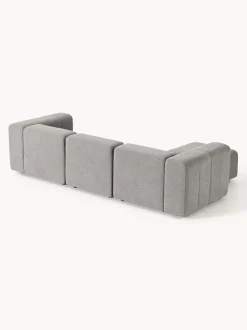 Sofá modular en tejido bouclé con reposapiés izquierdo/derecho Lena (4 plazas)