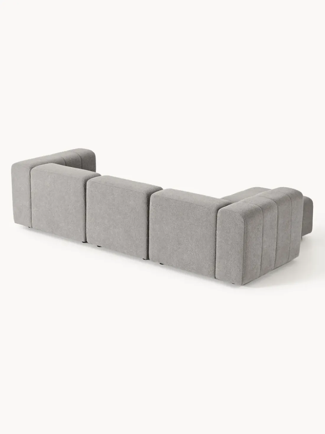 Sofá modular en tejido bouclé con reposapiés izquierdo/derecho Lena (4 plazas)
